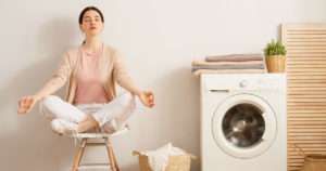 Woman completes laundry