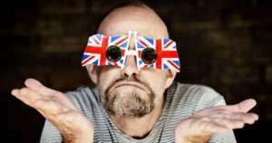 Man in union jack glasses