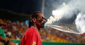 Snoop Dogg smoking the olympic torch