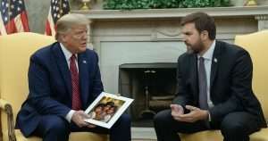 Donald Trump and JD Vance looking at a photo