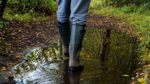 Man walking in wellington boots