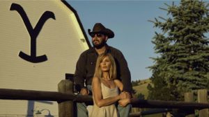 Rip and Beth in front of the Yellowstone barn