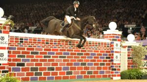 Douglas Duffin and Volcano clear the big red wall.