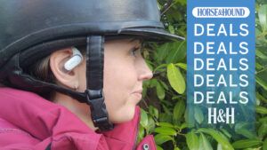 Horse rider wearing Shokz headphones and riding hat, with H&H deals graphic