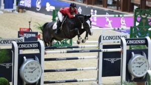 Chromatic B clears a large oxer of rails at the 2024 FEI World Cup Final in Riyadh.