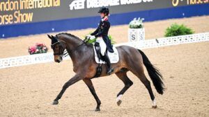 Laura Tomlinson and Soegaards Bon Royal competing at the 2024 London International Horse Show