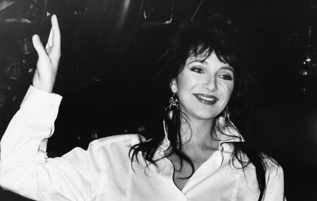 a black and white photograph of Kate Bush in 1985