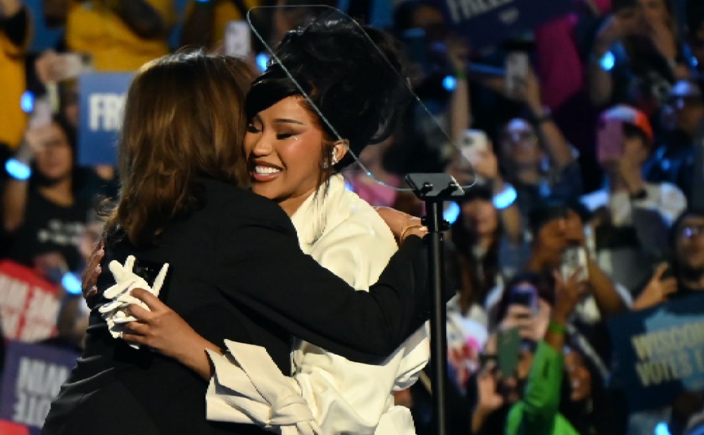 Kamala Harris and Cardi B embrace on stage at Wisconsin Campaign Rally. Credit - Kyle Mazza.