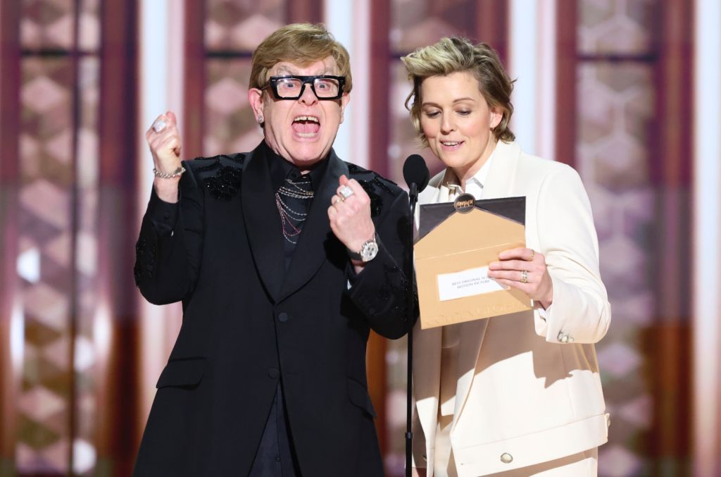 Elton John, Brandi Carlile present the award for Best Original Score during the 82nd Annual Golden Globes. CREDIT: Rich Polk/GG2025/Penske Media via Getty Images