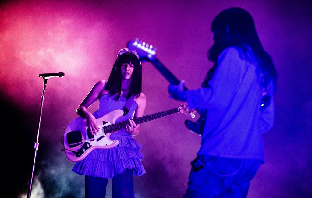 Khruangbin performing live on stage