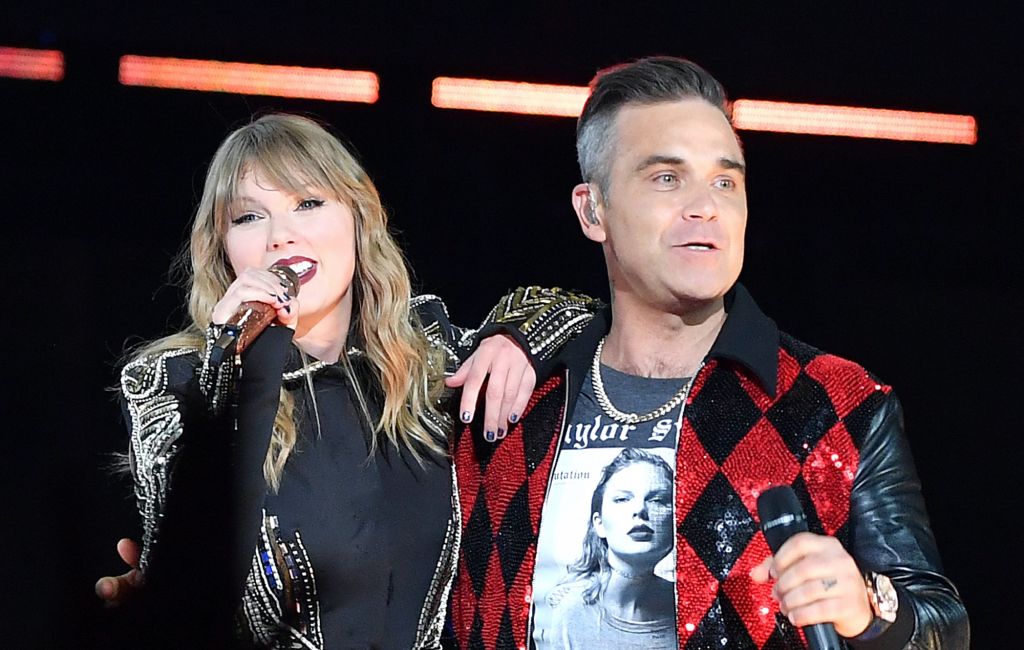 Taylor Swift and Robbie Williams performing live on stage together in 2018