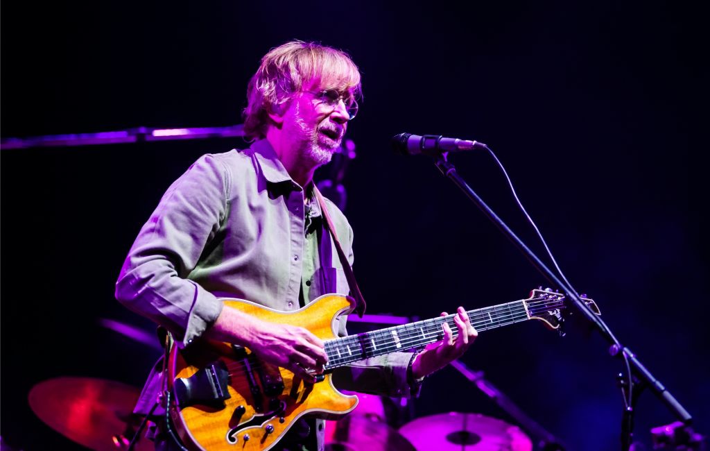 Trey Anastasio performing live on stage with Phish