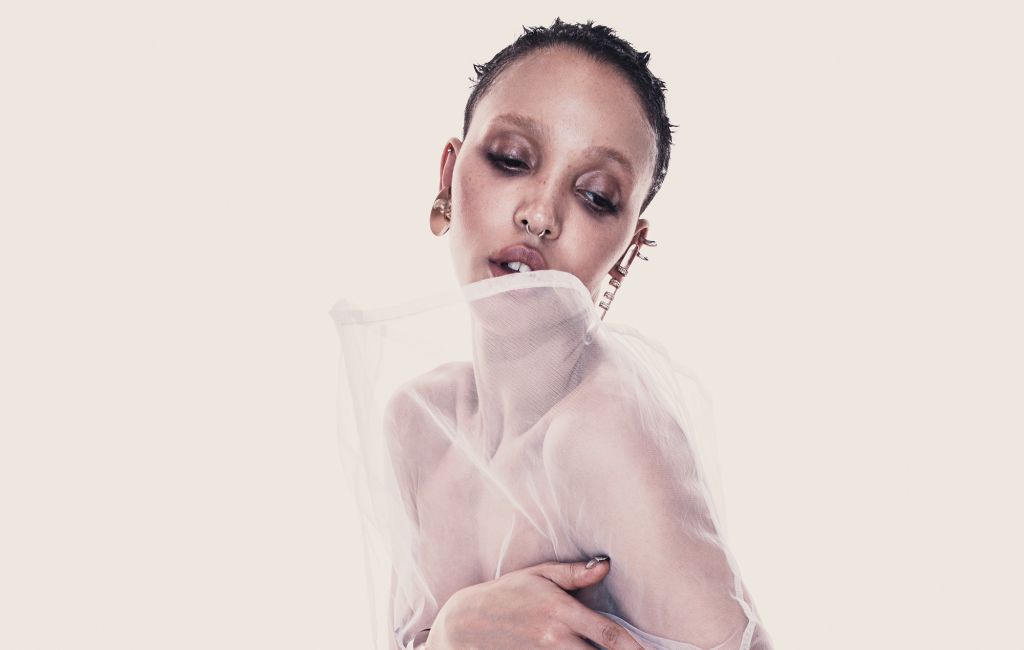 FKA twigs photographed in translucent clothing, photo by Jordan Hemingway