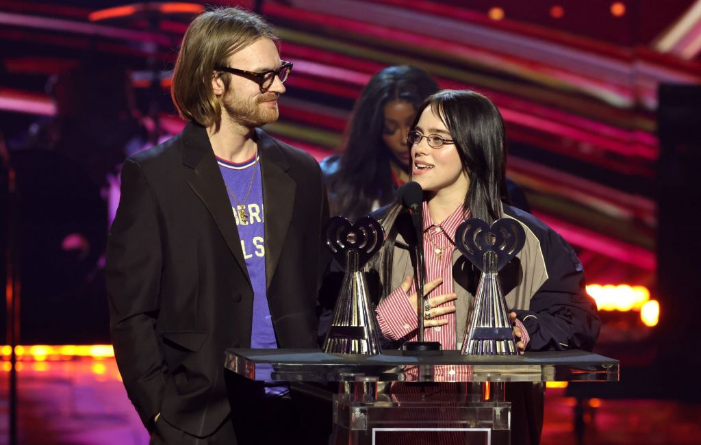 FINNEAS and Billie Eilish accept the Album of the Year Award onstage at the 2025 iHeartRadio Music Awards