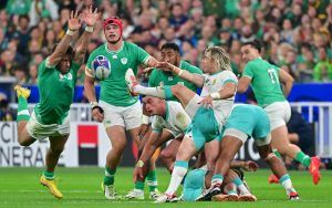 South Africa's Faf de Klerk kicks as Ireland players close him down in the teams Rugby World Cup 2023 match