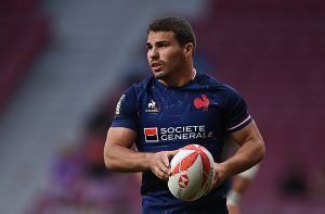 France's Antoine Dupont holds the ball during an HSBC Madrid Rugby Sevens match against Great Britain.