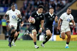 Wallace Sititi of New Zealand runs with the ball during the Autumn Nations Series 2024 match against England.