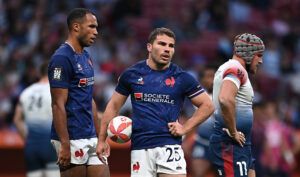 France's Antoine Dupont holds the ball during a break in play in an HSBC Madrid Rugby Sevens match against Great Britain.