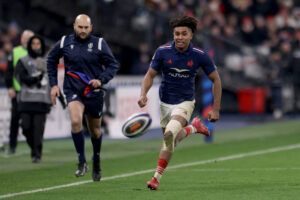 France's Théo Attissogbe chases the ball in the January 2025 Six Nations match against Wales