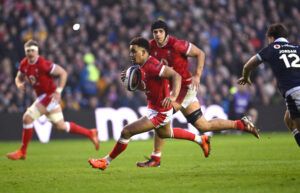 Wales' Ben Thomas on his way to scoring a try against Scotland in the 2025 Six Nations