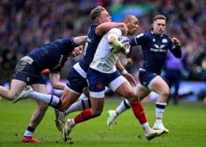 France’s Gael Fickou evades a challenge from Scotland’s Duhan van der Merwe in the Six Nations 2024 match.