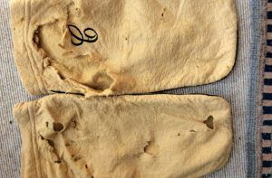 Well-worn but loved monogrammed flannel shoe bags