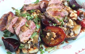 Warm grouse, plum, blue cheese and walnut salad