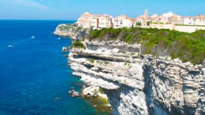 Gorgeous white cliffs with azure sea and the sun beating down