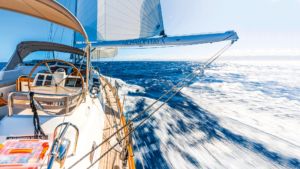 Point of view of a yacht sailing through water