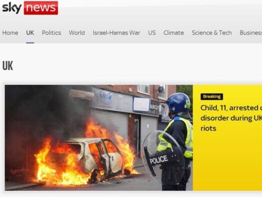 Sky News website homepage on 28 August 2024. UK subsection is highlighted and top story headline is: "Child, 11, arrested over disorder during UK riots" with a picture of a car on fire and a policeman looking at it