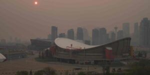 Downtown Calgary obscured by wildfire smoke in 2023.