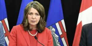 Alberta Premier Danielle Smith speaking at a press conference.