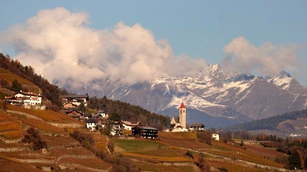 A town with mountains in the background