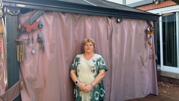 Janet Kitson, of Mississauga, says her backyard gazebo, which she has had in place for 20 years, has been ordered removed by the condo board, under a new set of rules issued earlier this year.