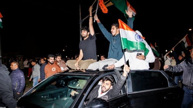 Members of Brampton’s Hindu community hold a rally, blocking traffic, near the Hindu Sabha temple on Nov. 4, 2024.