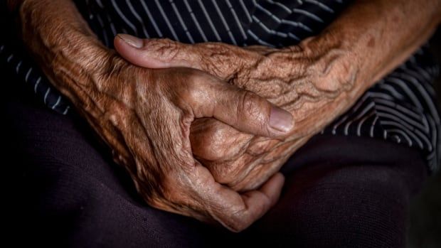 A photo of an elderly person's hands.