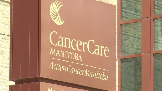 A sign is pictured outside, saying "CancerCare Manitoba - ActionCancerManitoba"