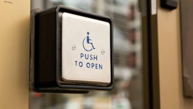 A button people who use wheelchairs can push to open doors.