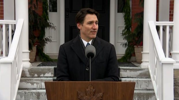 The prime minister speaks at a podium