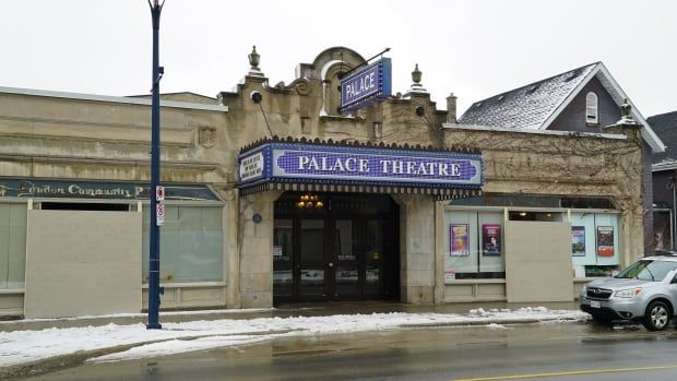 The Palace Theatre, pictured here on Dec. 24, 2024, resorted to the temporary measure of covering two of its doorways in plywood to prevent people from seeking shelter and starting warming fires inside them.