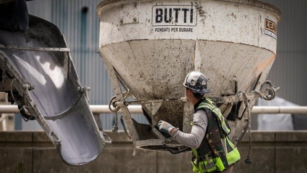 A construction worker is shown onsite.