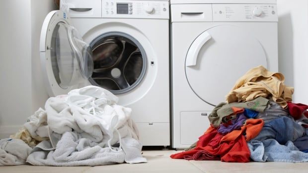 Two loads of laundry, one whites, one colour