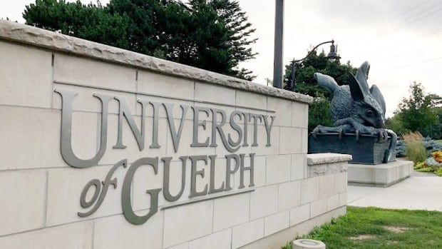 A brick sign that reads University of Guelph.