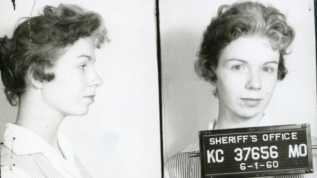 Black and white mug shot of a woman 