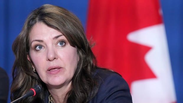 Alberta Premier Danielle Smith speaks to the media during the fall meetings of Canada's premiers hosted by Ontario in Toronto, Monday, Dec. 16, 2024.