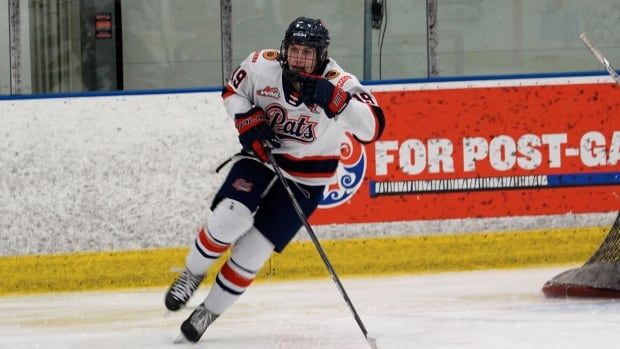 A hockey player mid-stride.