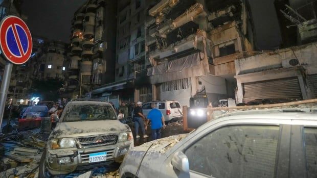 Debris is seen strewn about a Beirut street in the aftermath of an Israeli airstrike on Thursday.