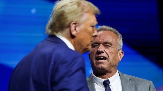 Donald Trump and Robert F. Kennedy Jr. appear on a stage together in Duluth, Ga.