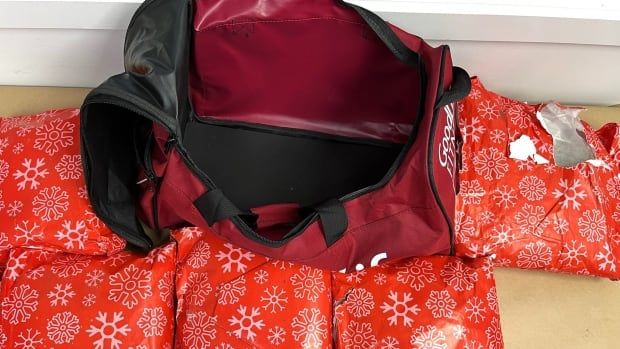 The New Zealand Customs Service posted this image to its social media account on X, showing what it said was roughly 10.2 kilograms of methamphetamine, wrapped as though it were a Christmas present.