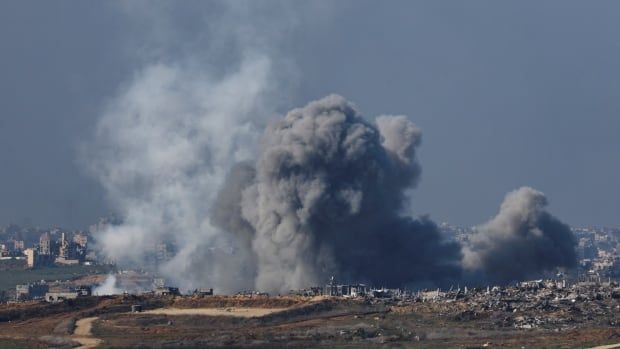 Smoke rises from an Israeli strike as the Israeli military conducts operations inside the Gaza Strip.